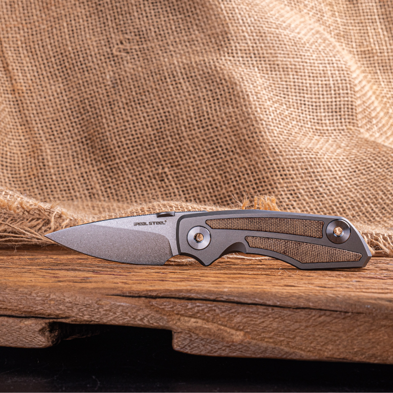 Real Steel Delta 2600 Frame Lock Folding Knife - 2.90" S35VN Stonewashed Drop Point Blade, Titanium with Natural Canvas Micarta Inlays